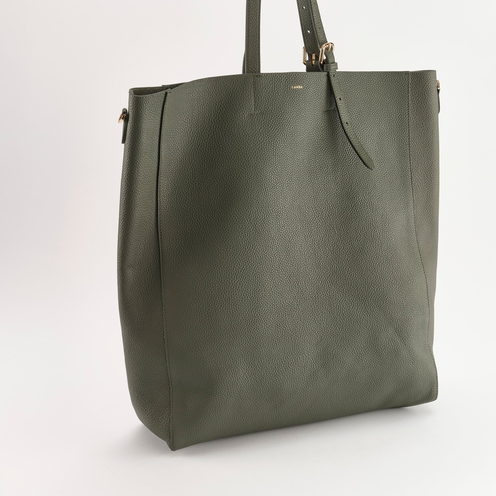 Green tote bag on a white background