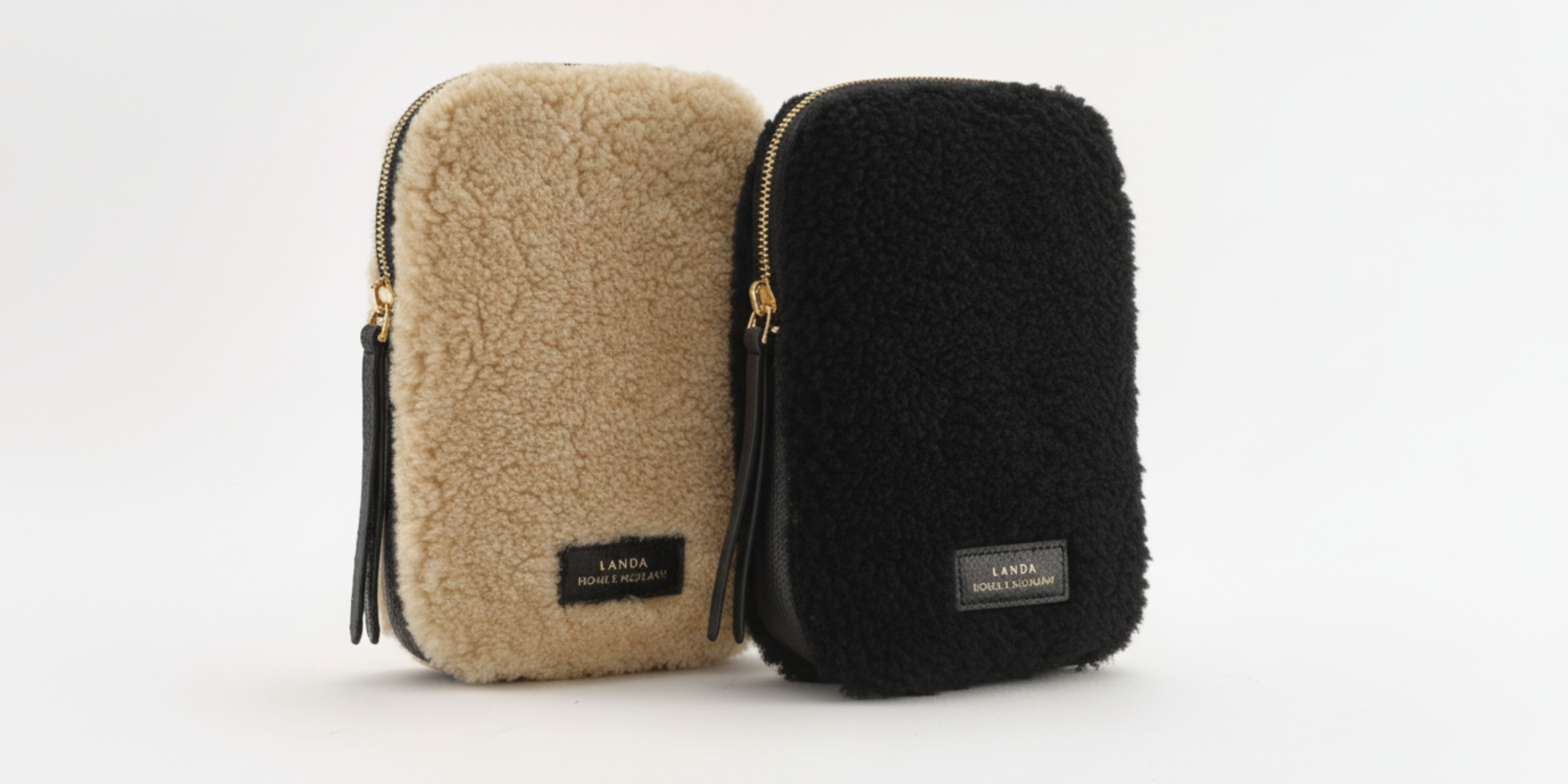 Two pouches, one beige and one black, with visible labels on a white background.